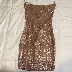 This is a pink and gold sequin mini dress, good for party, prom, and birthday.